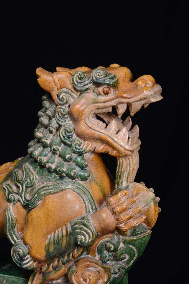 A large glazed stoneware tile representing a Pho dog, C - 4