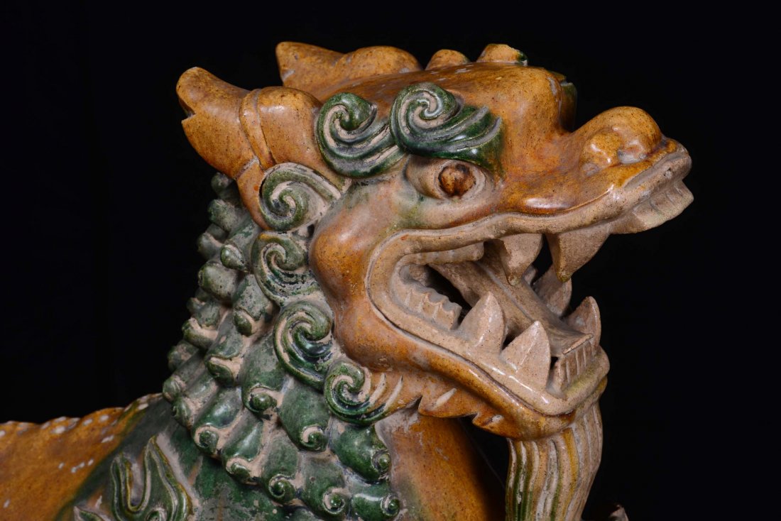 A large glazed stoneware tile representing a Pho dog, C - 5