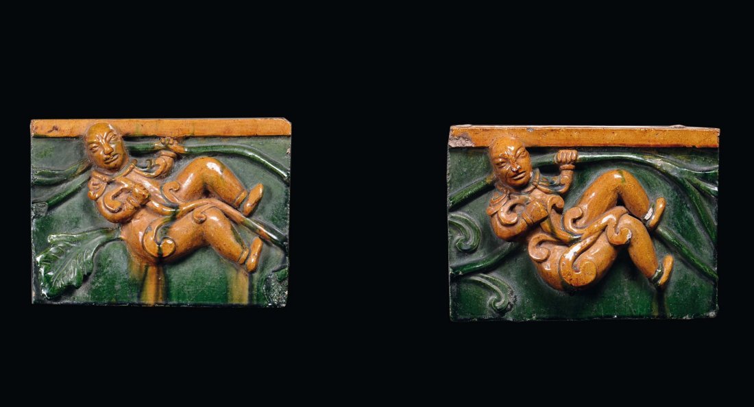 A pair of enamelled stoneware tiles with children, Chin