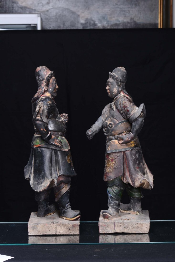 A pair of large black lacquered earthenware Dignitaries - 2