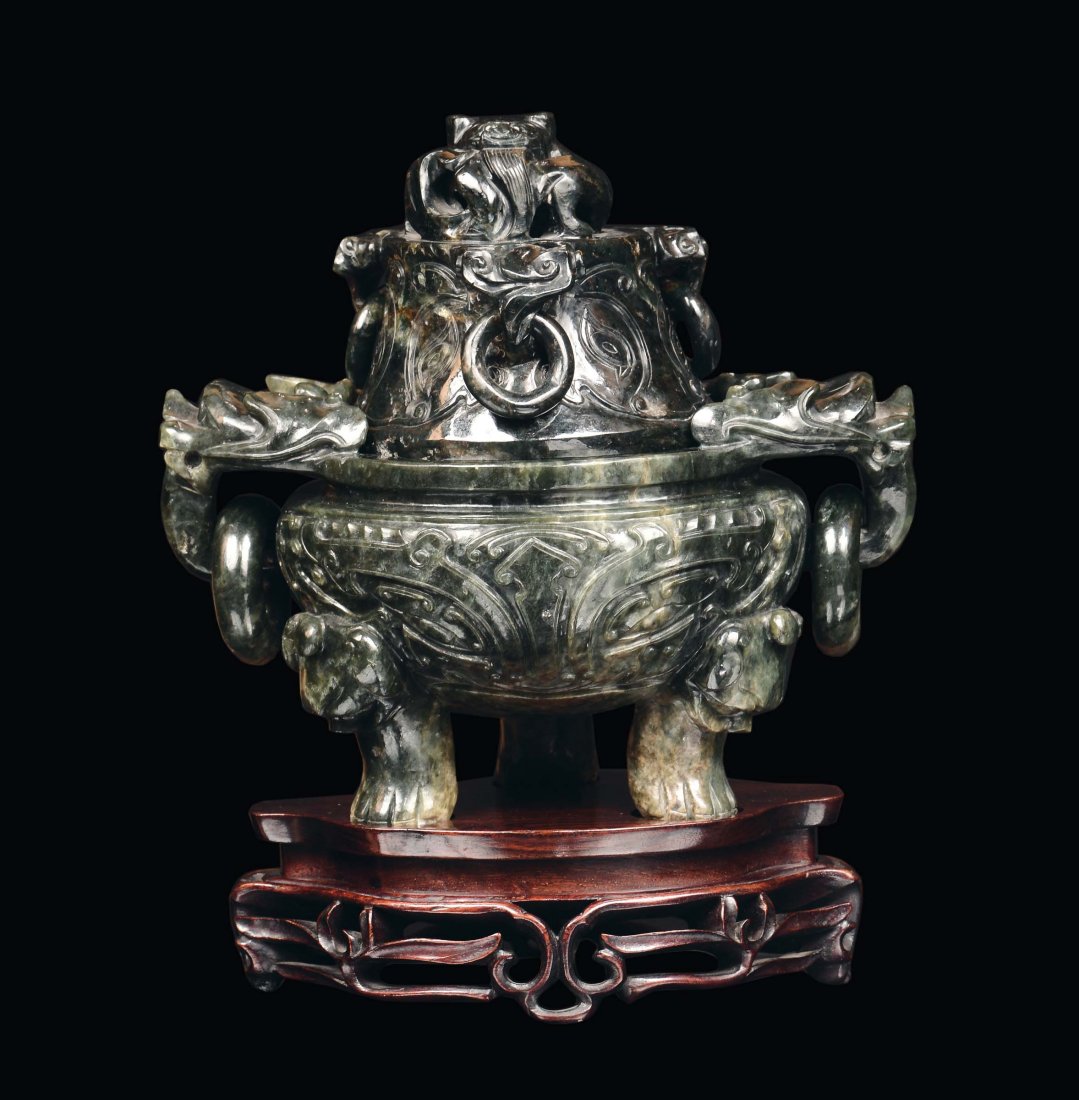 A spinach jade capped censer sculpted with archaic shap