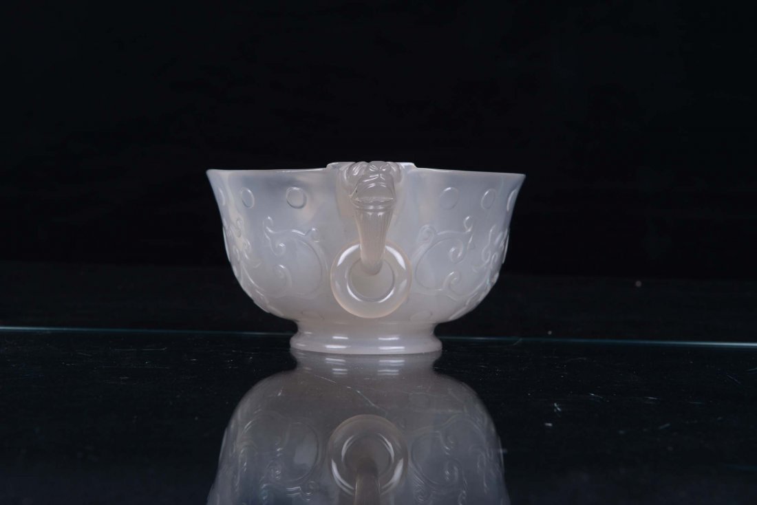 An agate cup with lateral rings, China, Qing Dynasty, 1 - 2