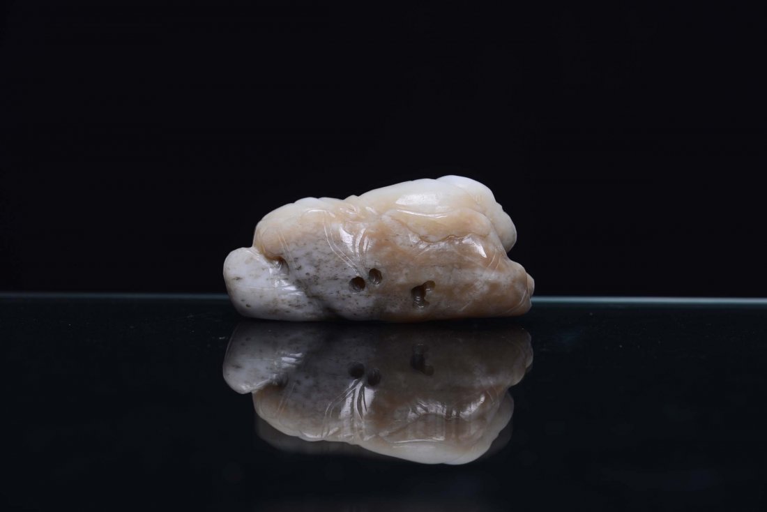 A small jade lying down oriental figure, China, Qing Dy - 2