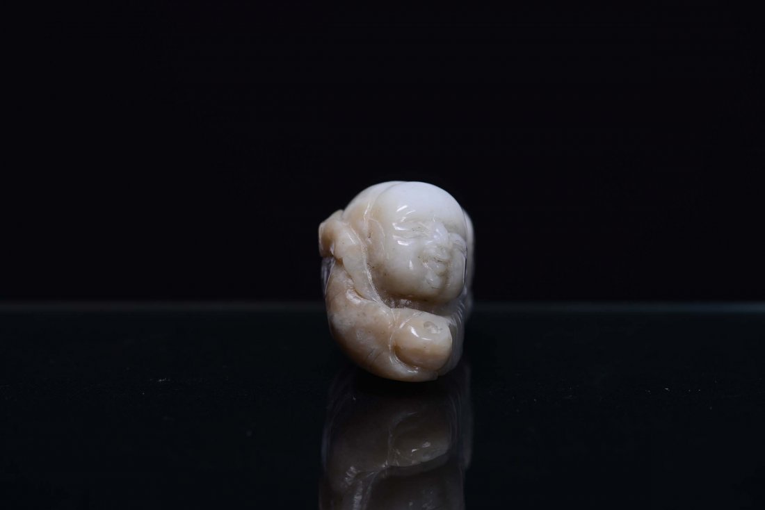 A small jade lying down oriental figure, China, Qing Dy - 3