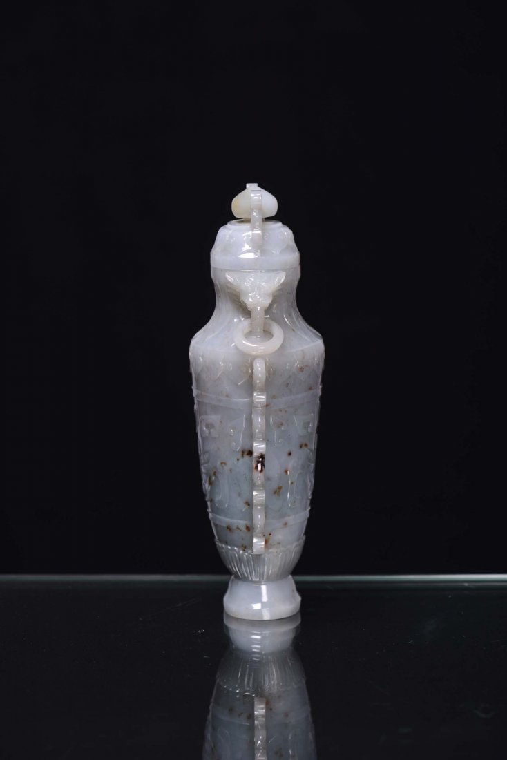 A Celadon green jade capped vase, Mogul taste with arch - 2