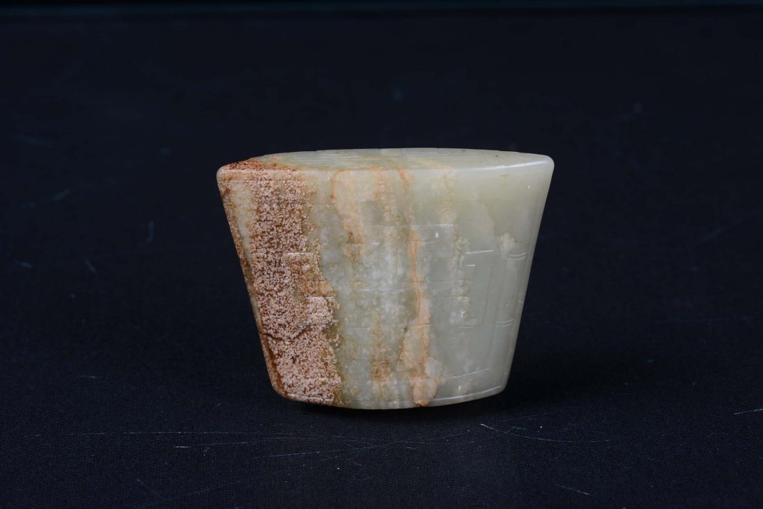 A Celadon white and russet jade, archaic shape, China,  - 2