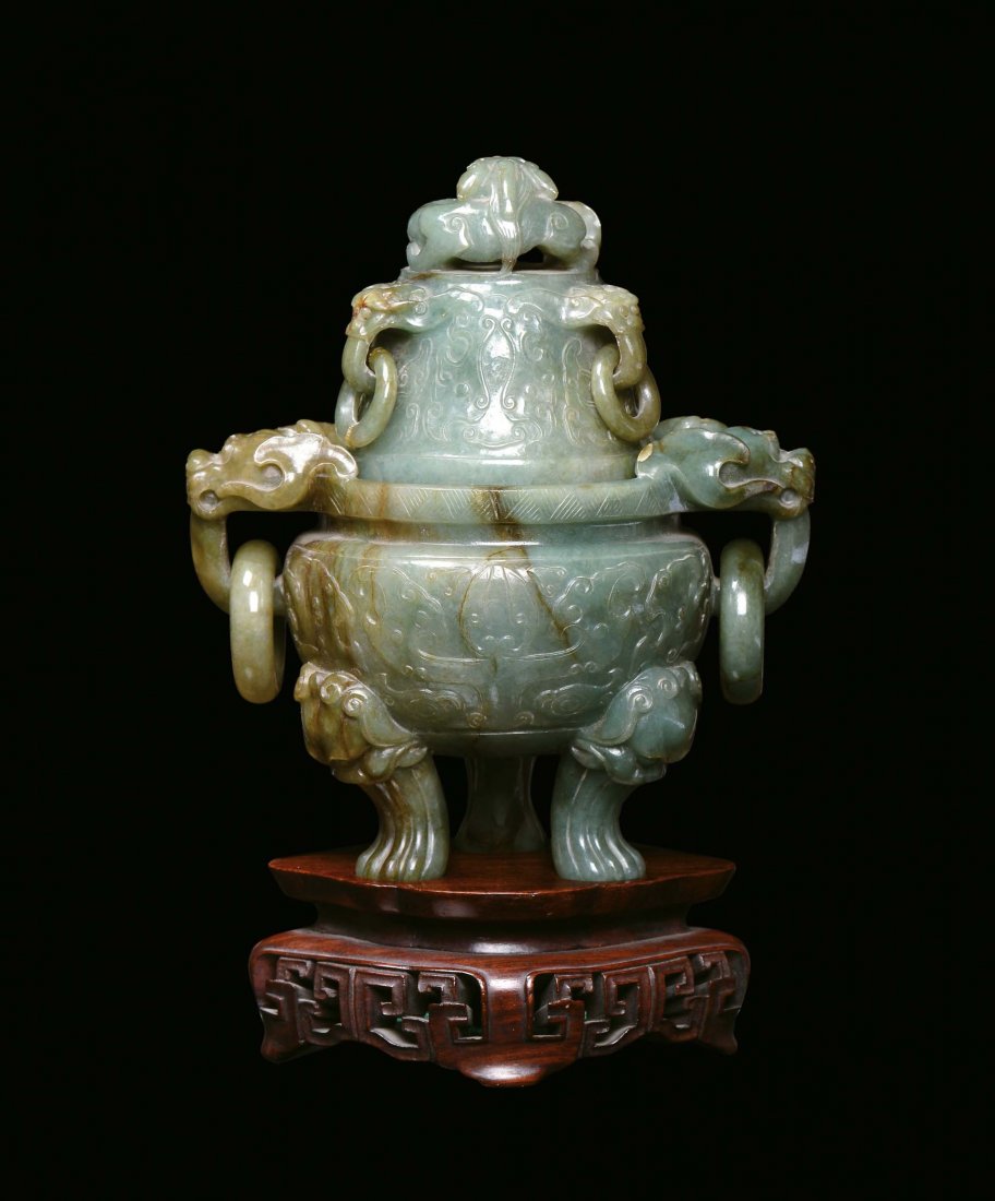 A green jade capped censer in archaic shape with inclus