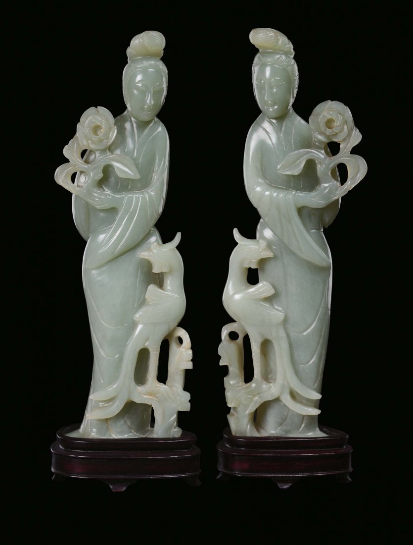 A pair of green jadeite Guanyin, China, Qing Dynasty, 2