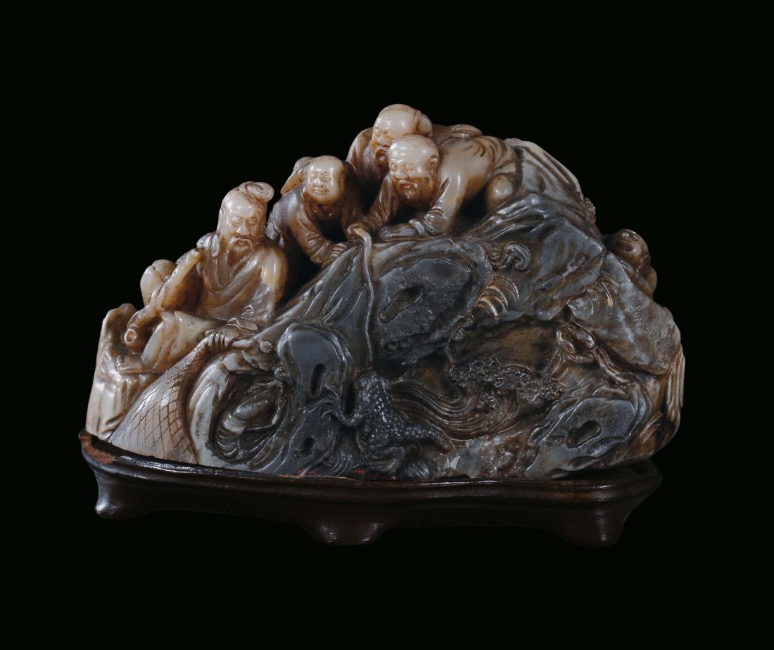 A rare soapstone seal representing fishermen, China, Qi: cm 9,5x4x5,5
