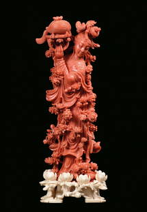 A red coral group with Guanyin finely sculpted with ivo: gr. 318, h cm 20