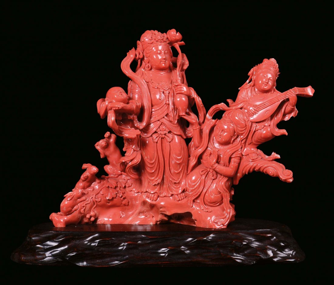 A red coral group with violinist, people and animals, C