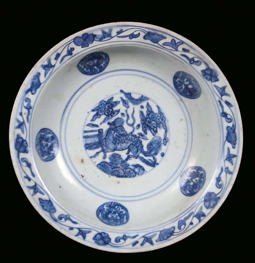 A porcelain plate decorated with azure monochrome with 