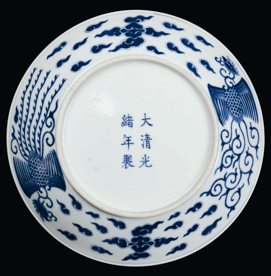 A white and blue porcelain plate decorated with phoenix - 2