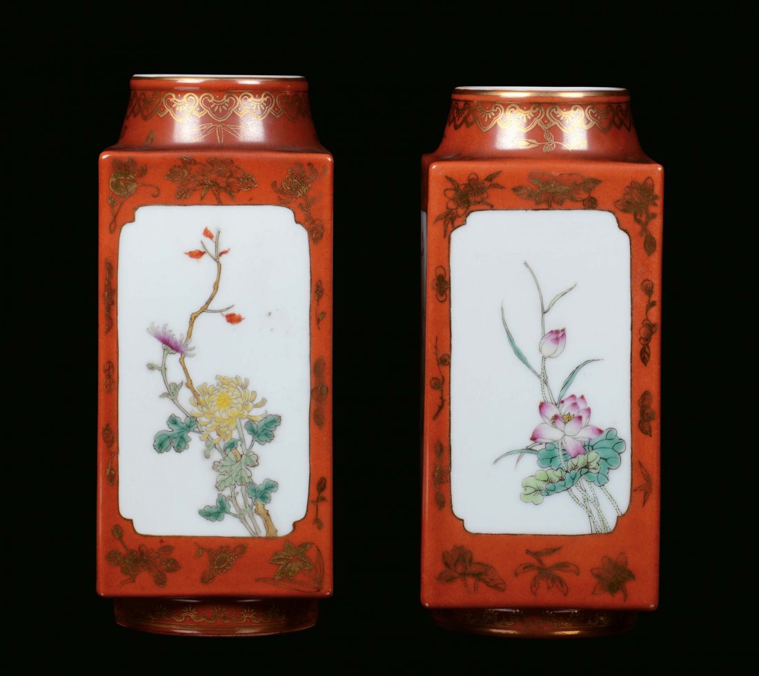 A pair of porcelain vases decorated in polychrome in th