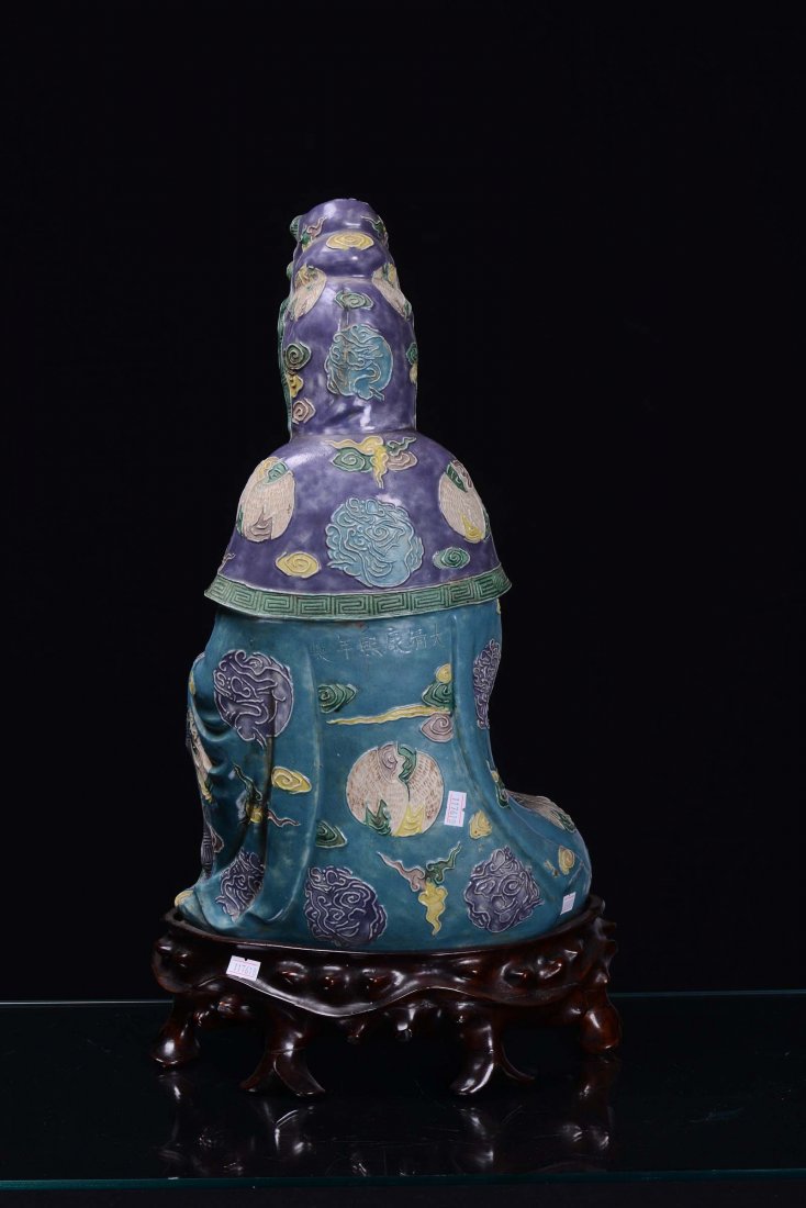 A large polychrome porcelain Guanyin in the colours of  - 2