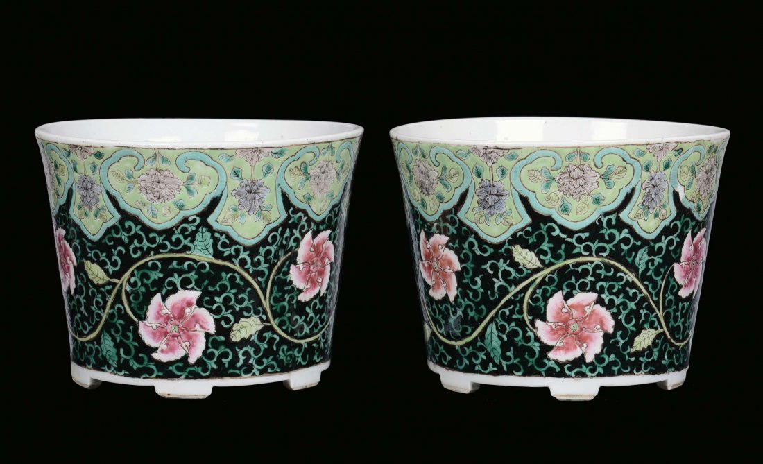 A pair of porcelain cachepot with floral decoration on 