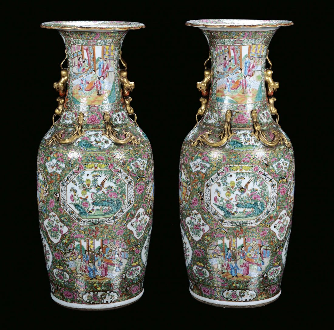 A pair of polychrome porcelain Famille Rose vases, Chin