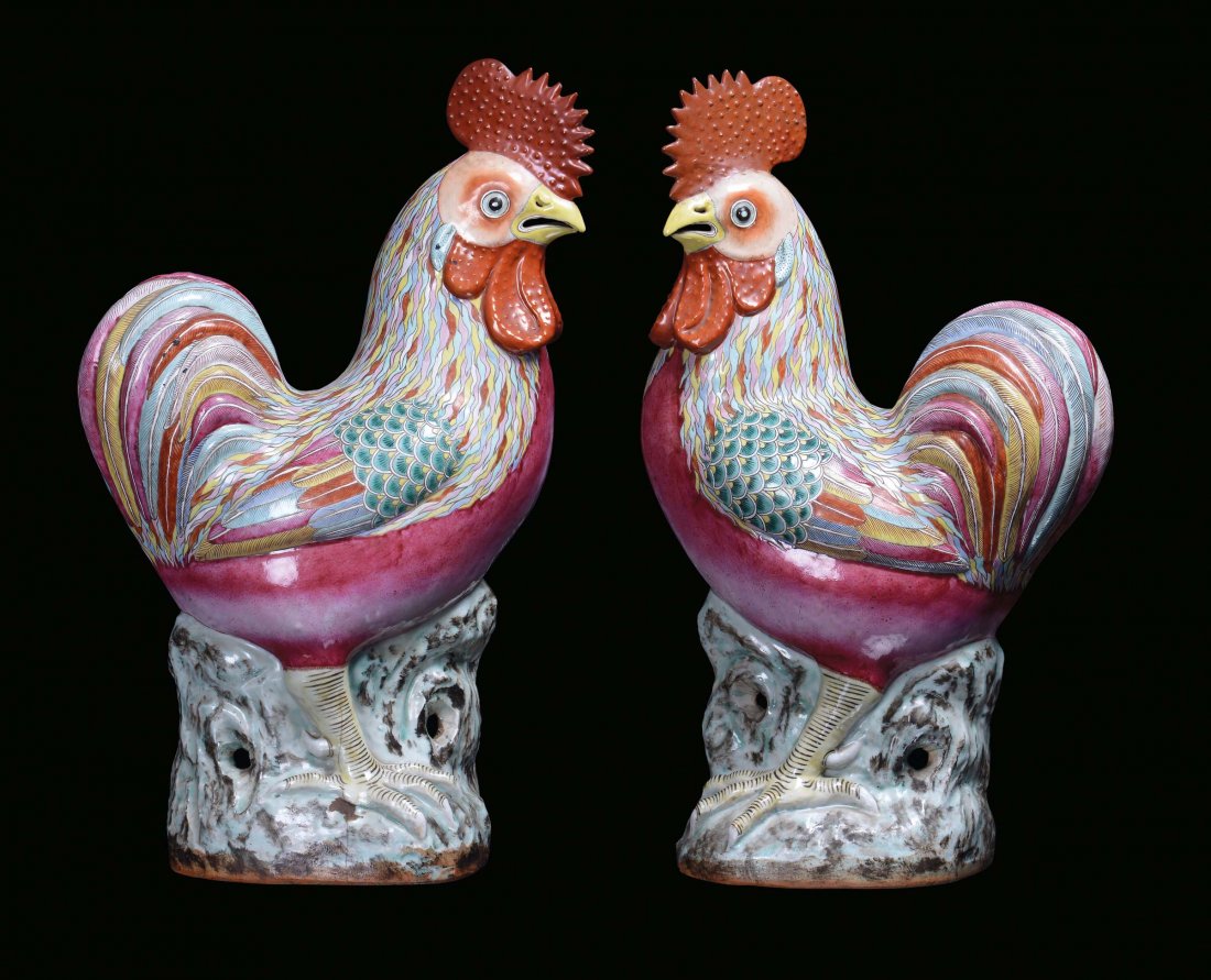 A pair of Famille Rose porcelain sculptures representin