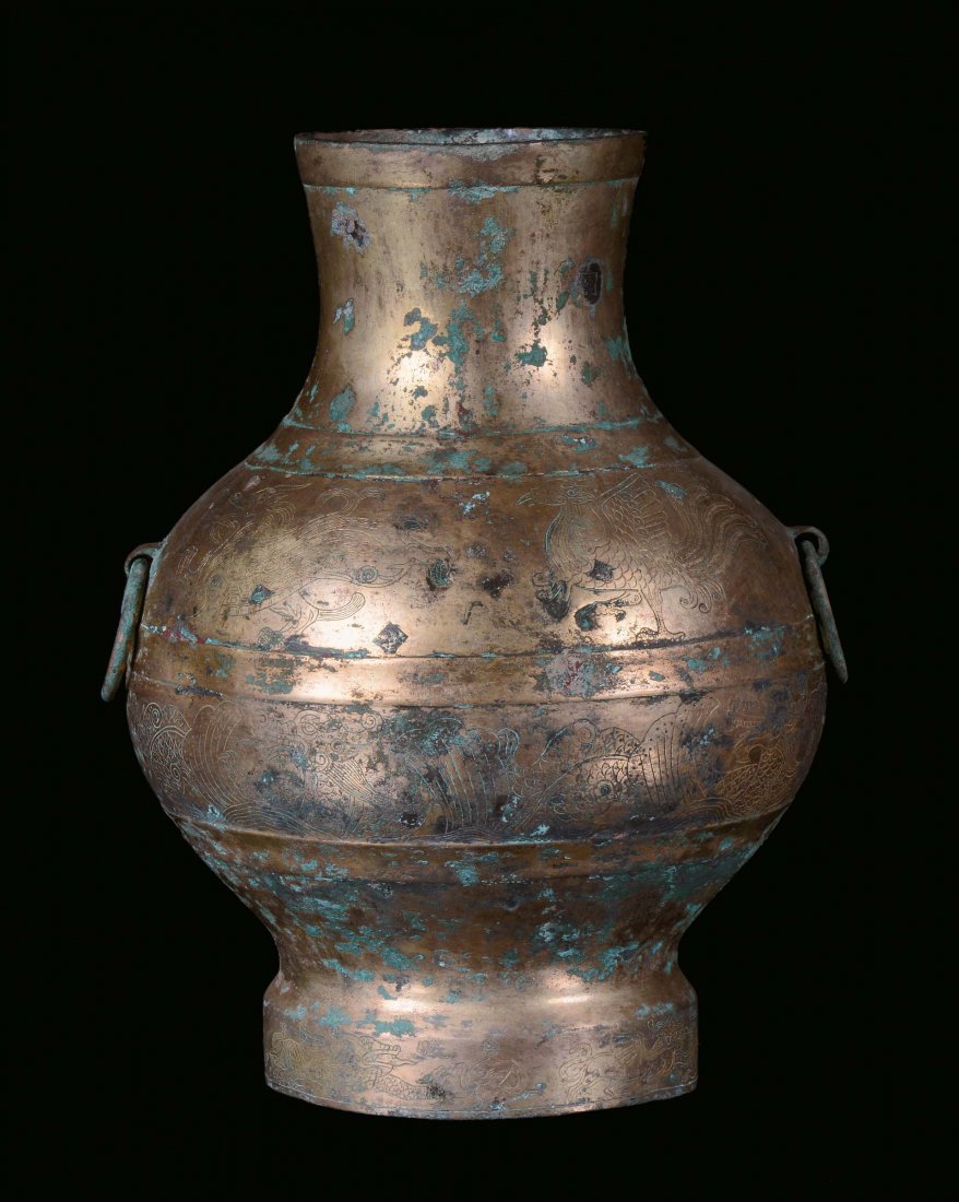 A gilt bronze vase carved with dragons and phoenixes, C: h cm 28