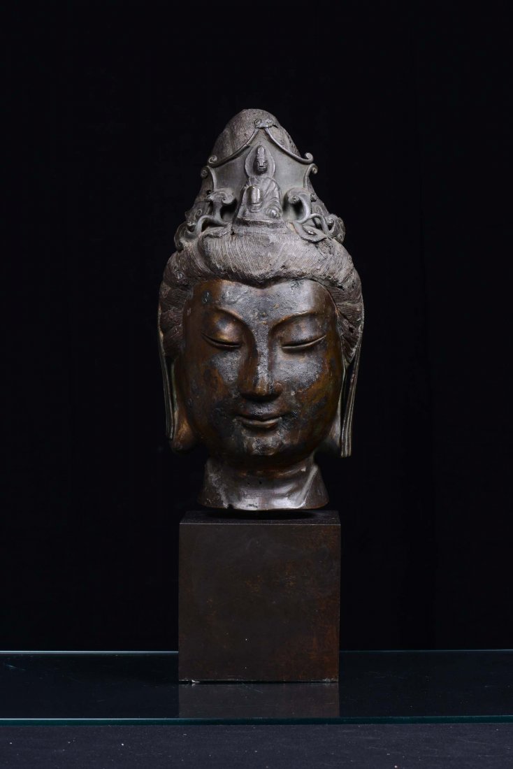 A large dark coating bronze female head, China, Qing Dy