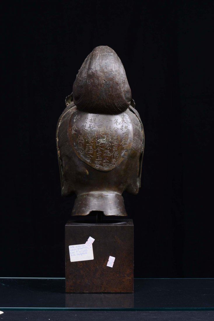 A large dark coating bronze female head, China, Qing Dy - 3