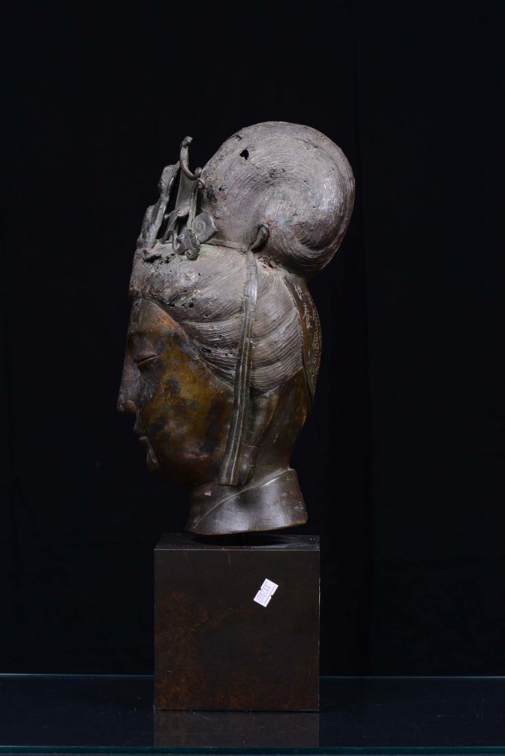 A large dark coating bronze female head, China, Qing Dy - 4