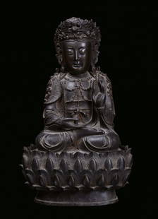 A dark coating bronze figure of Buddha, China, Ming Dyn: h cm 33