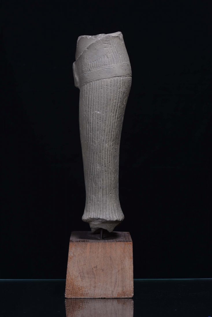 A fragment of a stone sculpture, Khmer, Indochina, 11th - 4