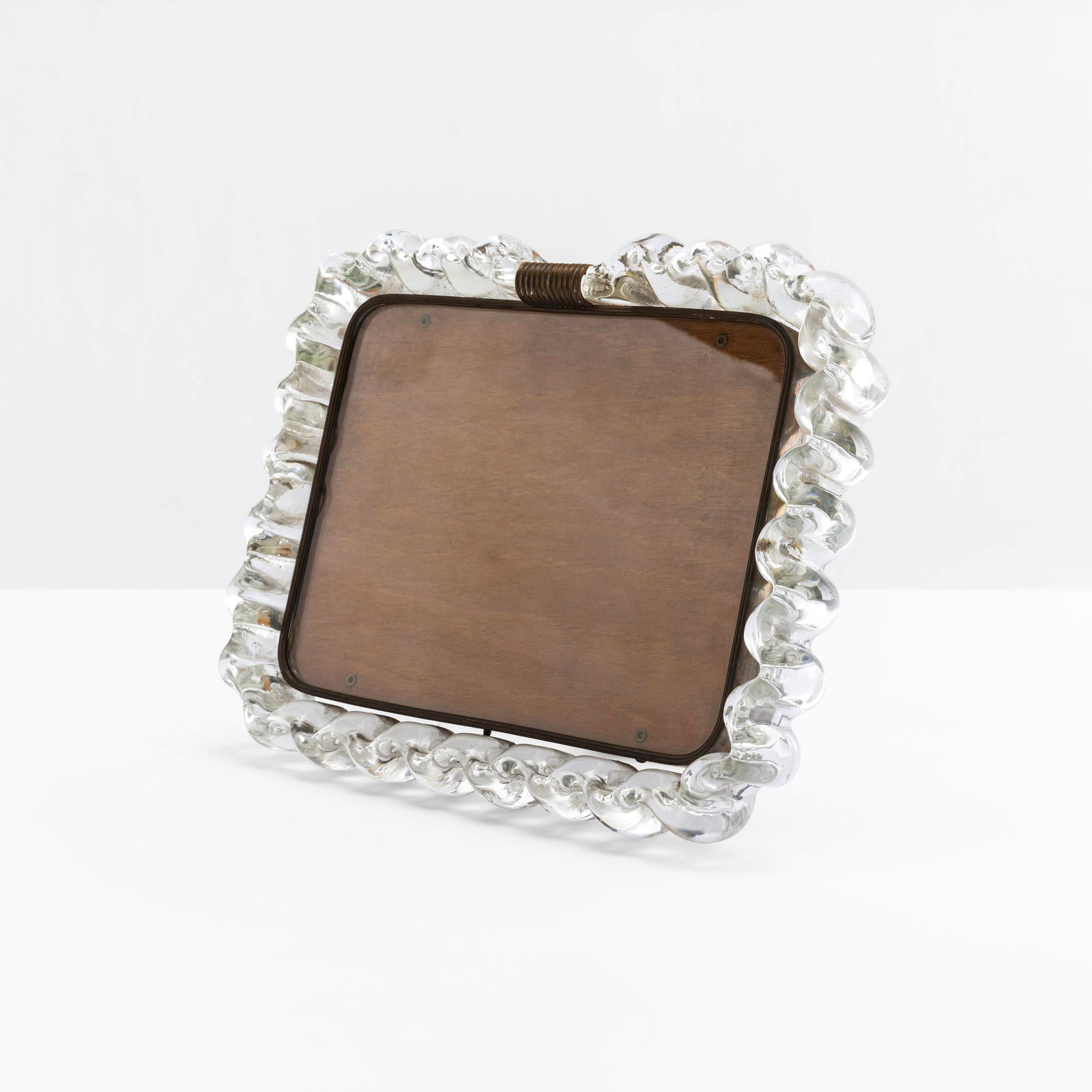 Carlo Scarpa Portafoto: Struttura in legno e ottone. Cornice in vetro di Murano. Marchio originale. Prod. Venini, Italia, 1940 ca.