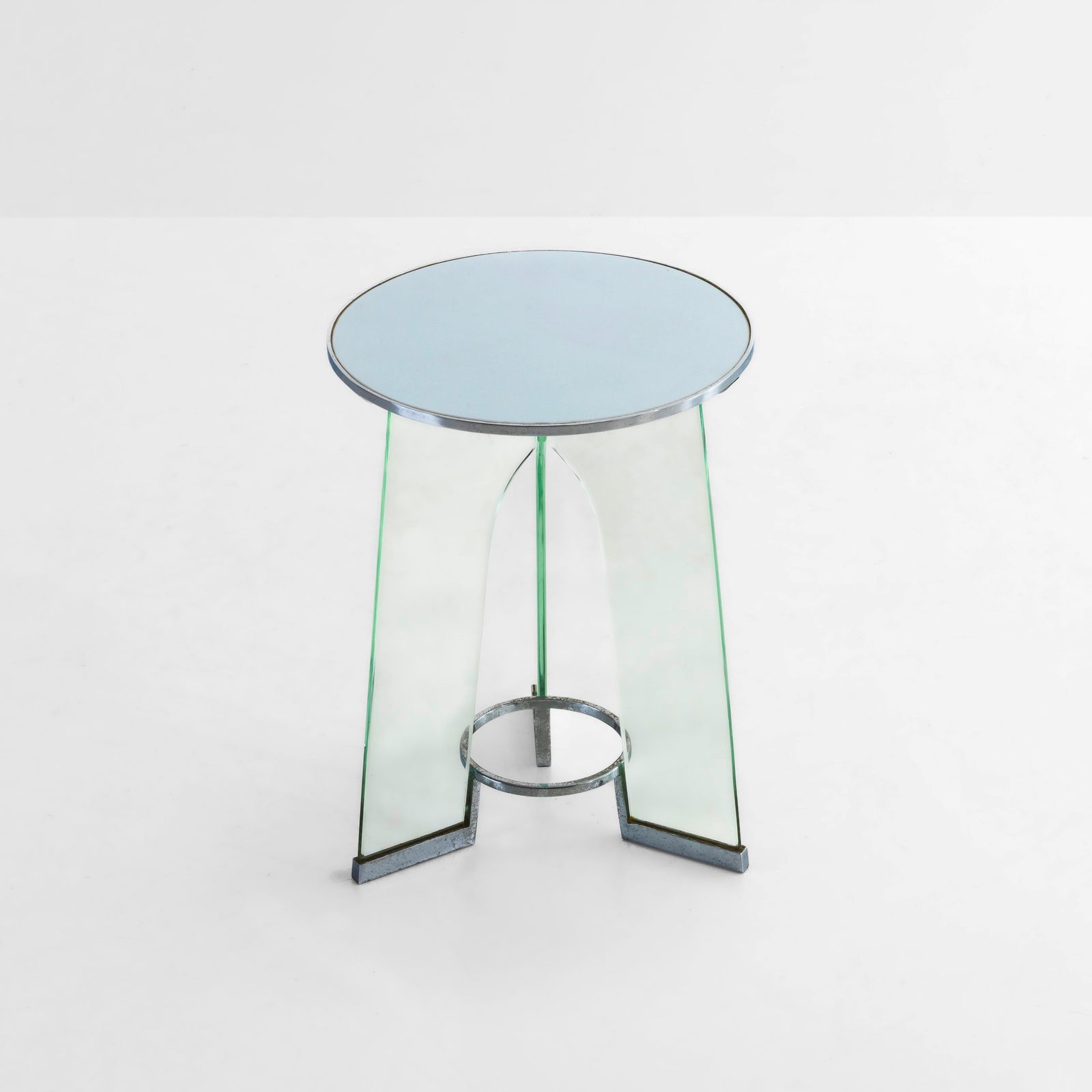 Gio Ponti Tavolo occasionale: Struttura in ottone nichelato e cristallo. Piano in vetro colorato. Prod. Fontana Arte, Italia, 1932.