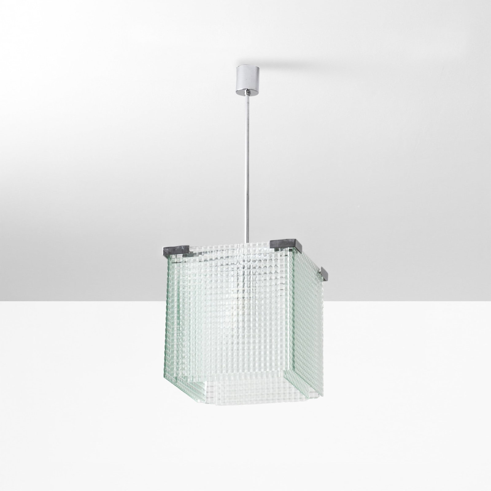 Franca Helg Lampada a sospensione: Struttura in metallo e diffusore in vetro stampato. Prod. Fontana Arte, Italia, 1960 ca. Domus n. 463, giugno 1968 . Measuers: cm 32X32X80