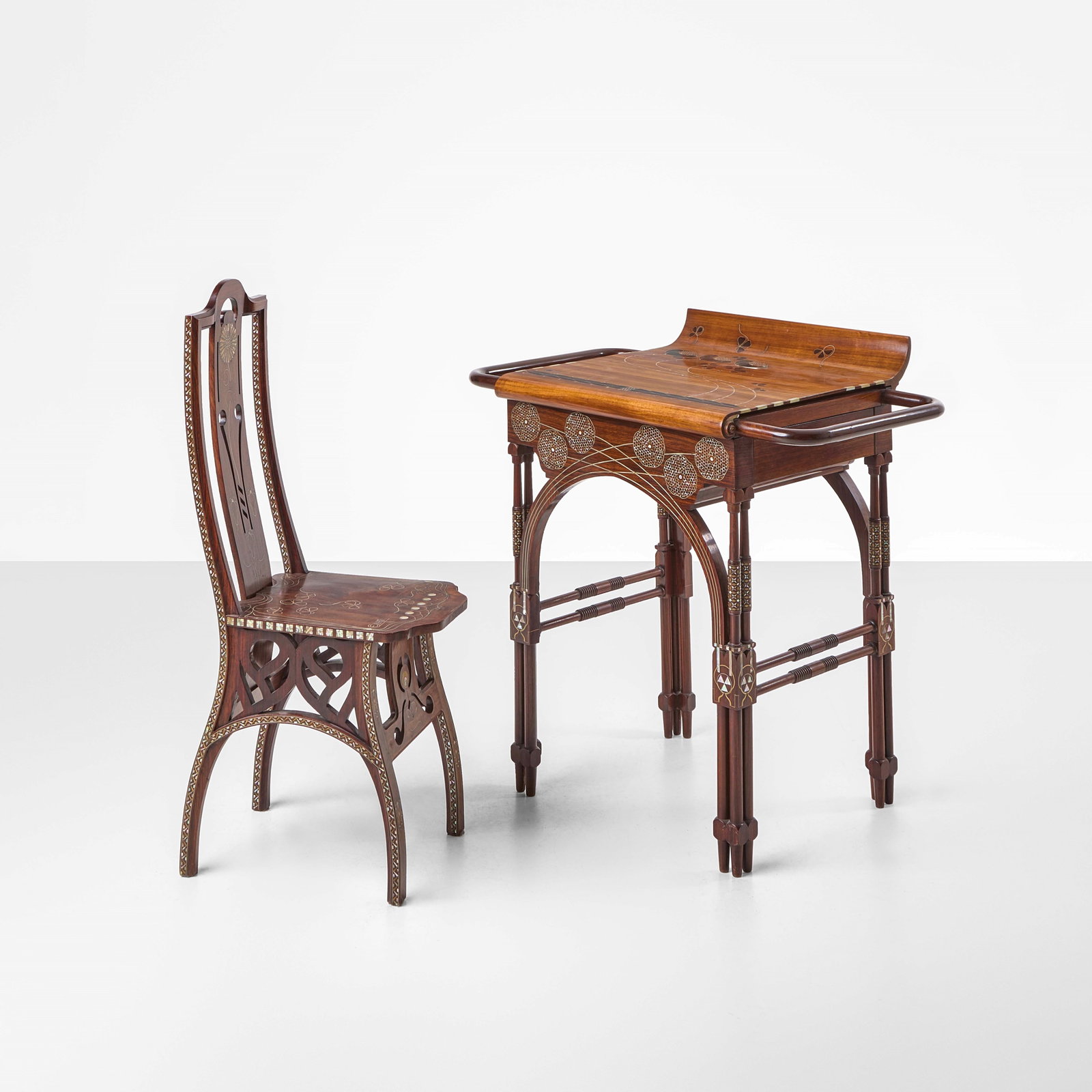 Eugenio Quarti Desk and chair: Wood and ebonized wood structure and top with mother-of-pearl, bronze, brass, and silver inlays. Glass tops. Original inlaid signature. Made for the Universal Exhibition in Paris in 1900. From a priva