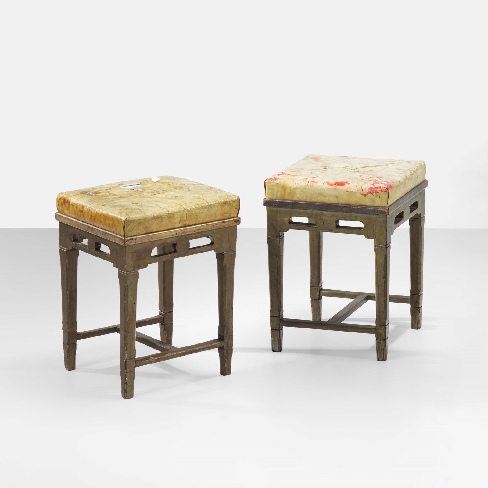Ernesto Basile Two benches: Painted wooden structure. Parchment upholstery. Italy, c. 1900. (similar model) E. Sessa, Mobili e Arredi di Ernesto Basile nella Produzione Ducrot, p. 108, Palermo, 1980 ( similar model) G.