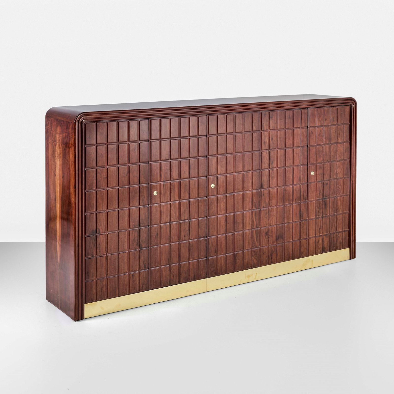 Osvaldo Borsani Storage unit: Wooden structure with brass details. ABV Arredamenti Borsani, Varedo, Italy, c. 1950. . Measuers: W. 250 - D. 45 - H. 141 Cm