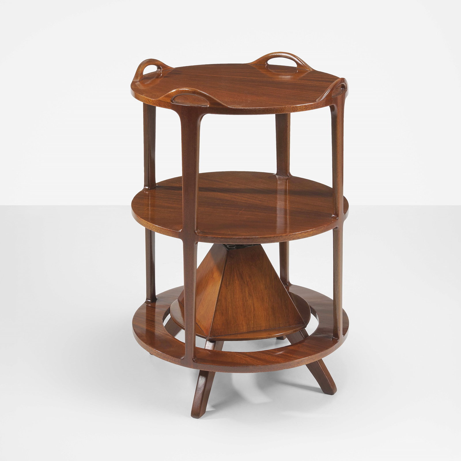 Guglielmo Ulrich Revolving bookcase: Wooden structure. From a private house - Milan. Italy, c. 1960. (elements) L. Sacchetti, Guglielmo Ulrich, p. 393, f. 211, Federico Motta Editore, 2009. . Measuers: W. 60 - H. 87 Cm