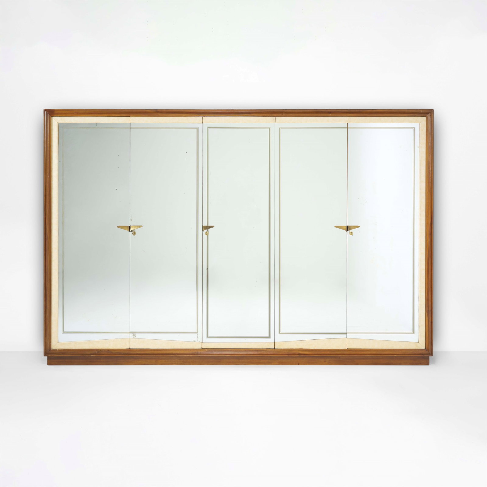 Osvaldo Borsani Cabinet: Wooden structure, wooden doors and mirrored glass. Brass and parchment details. Wood and glass interior. ABV Arredamenti Borsani, Varedo, Italy, c. 1950. . Measuers: W. 290 - D. 67 - H. 190 Cm