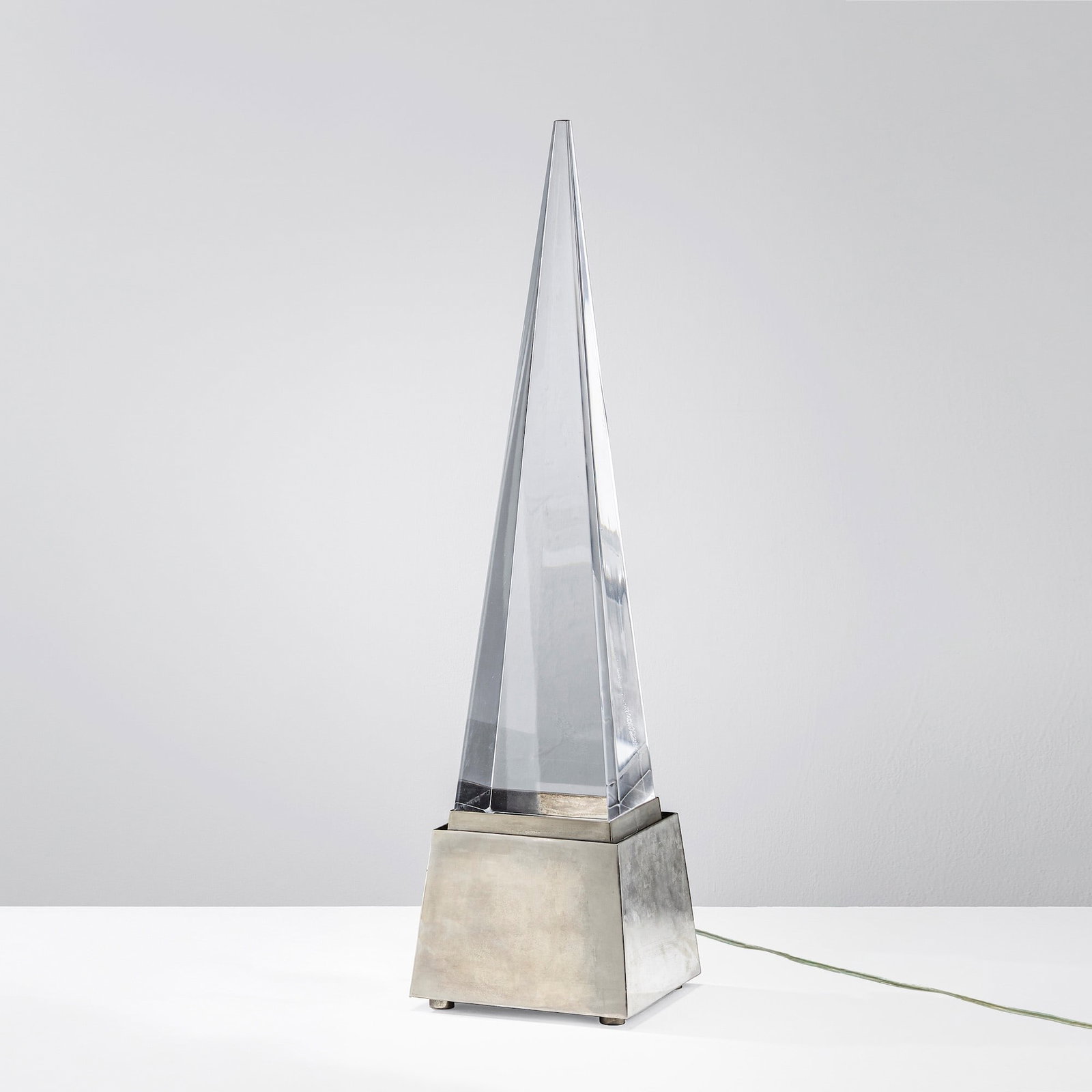 Gabriella Crespi Table lamp mod. Obelisk: Structure in nickel-plated brass, plexiglass diffuser. Engraved signature. Private collection - Milan. Crespi, Italy, c. 1970. . Measuers: W. 16 - D. 16 - H. 63 cm