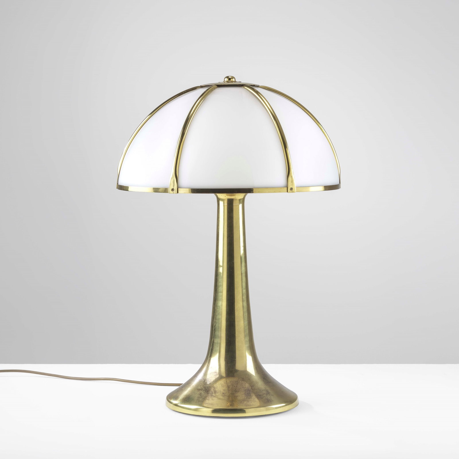 Gabriella Crespi Table lamp mod. Fungo from the Unicum series: Structure in brass, lampshade in brass and perspex. Engraved signature. Private collection - Milan. Crespi, Italy, 1970. . Measuers: cm 47X70