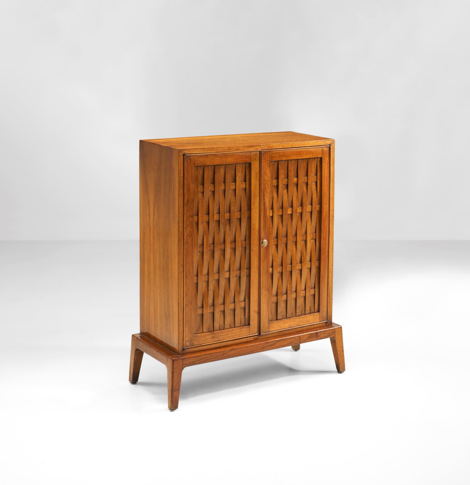 Paolo Buffa Mobile contenitore: Struttura e ante in legno. Prod. Italia, 1950. . Measuers: W. 76 - D. 35 - H. 101 cm