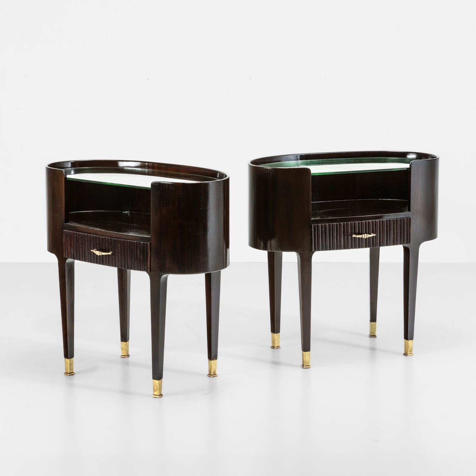 Paolo Buffa Due comodini: Struttura in legno, dettagli in ottone, piani in vetro. Prod. Italia, 1960 ca. . Measuers: cm 65X34X64