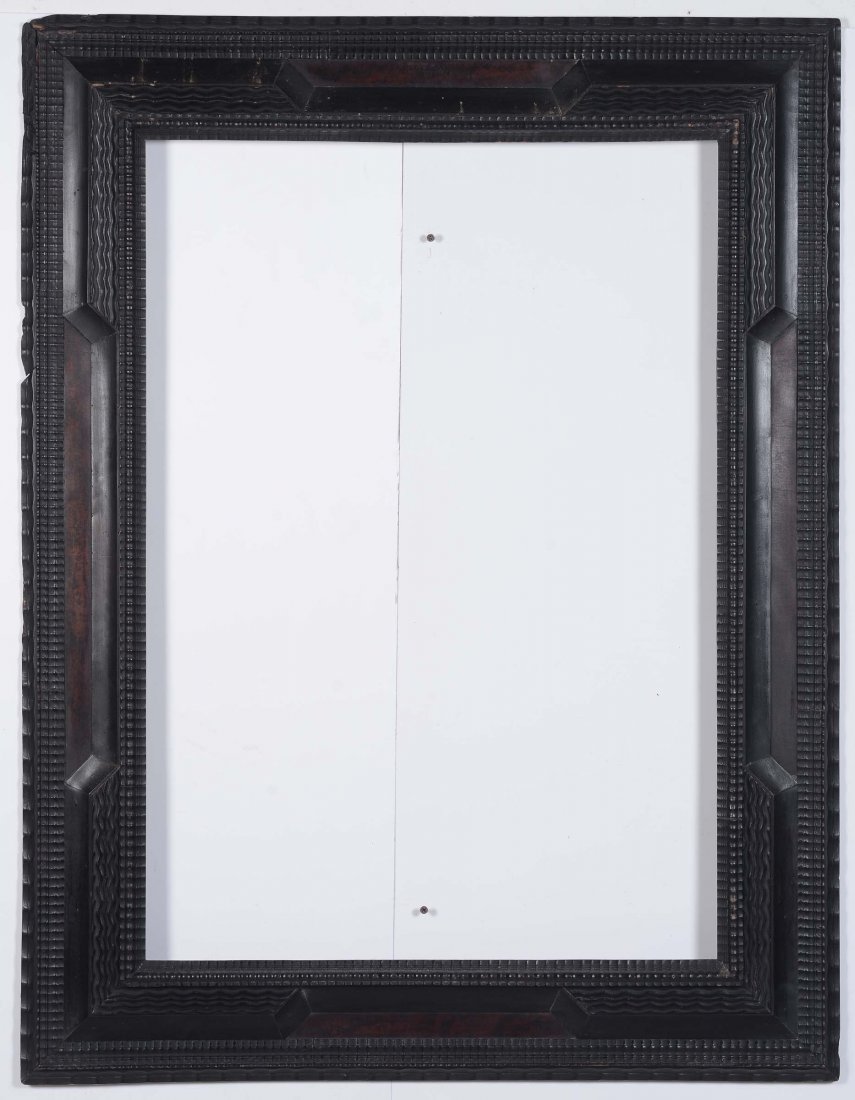Cornice guillochè in legno ebanizzato, Fiandre XIX: cm 132x100 (99x68,5)