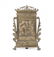 A molten, chiselled and gilt bronze pax representing
