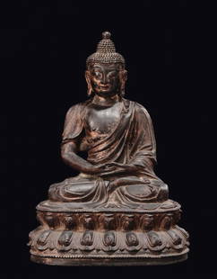 A bronze figure of Buddha on a double lotus flower,: h cm 26,5