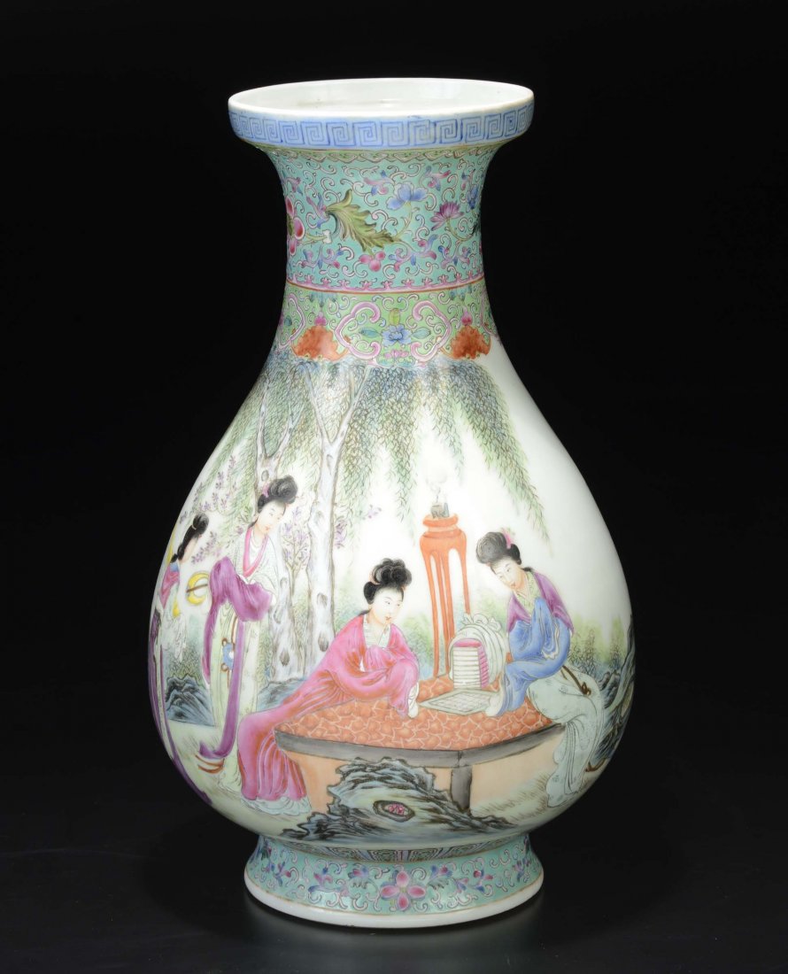 A polychrome enamelled porcelain vase with Guanyin and (1 of 3)