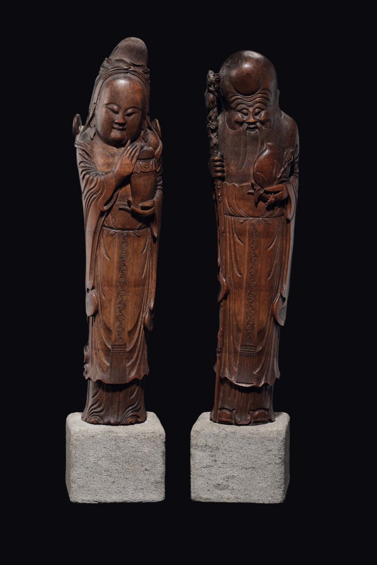 A pair of large carved wood figures, Guanyin and (1 of 1)