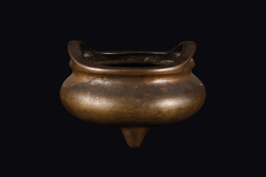 A bronze tripod two-handled censer, China, Ming (1 of 2)