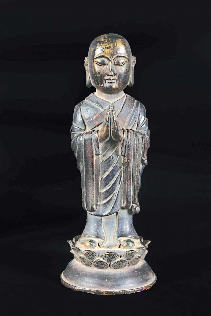 A semi-gilt bronze standing figure of monk, China, Ming (1 of 1)