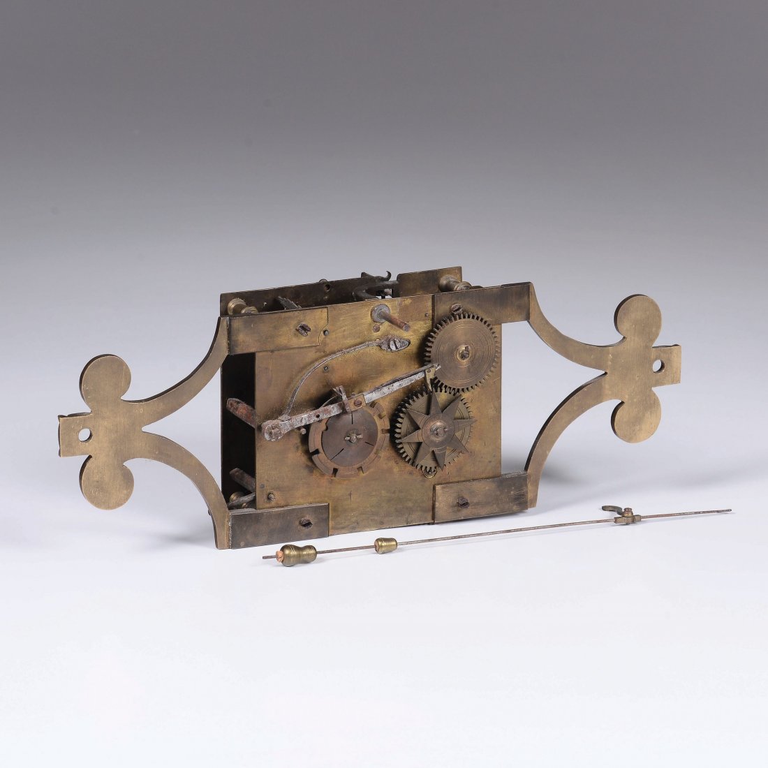 A mechanical clock piece, signed by Gio Antonini,: cm 35x12x10