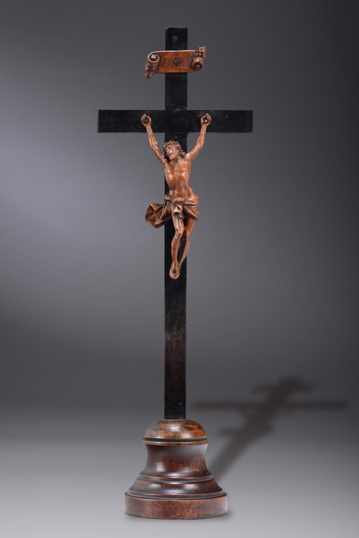 A boxwood figure of Christ and an ebonised pearwood (1 of 1)