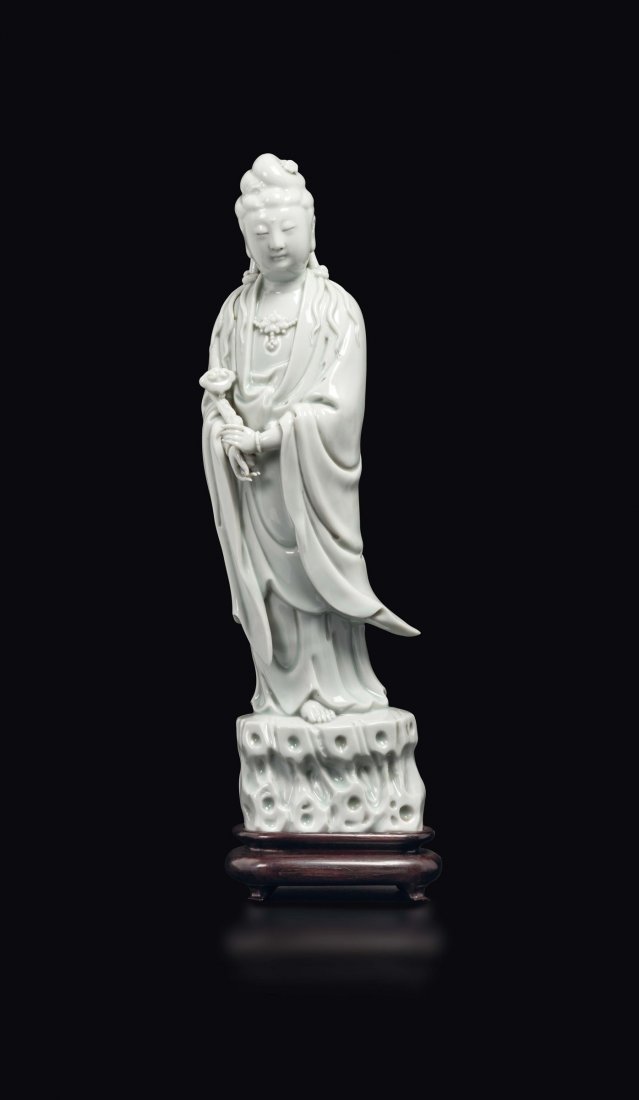 A Dehua figure of Guanyin with scroll, China, Qing (1 of 3)